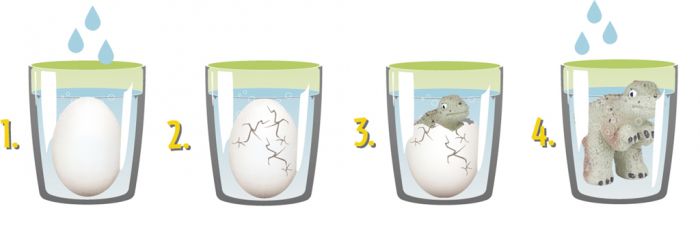 Schlüpfender Dino im Ei